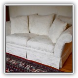 F6. Bauhaus white damask loveseat. Dimensions: 69"W x 37"D x 28.5"T - $300