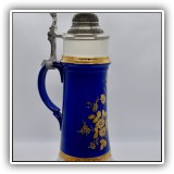 E31. Blue ceramic beer stein by TK - German. - $14