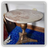F33. Marble round top side table. DImensions: 18"W x 15.5"T - $48