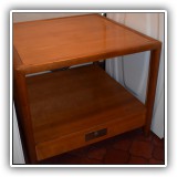 F18. Tiered Baker Furniture side table with drawer. Dimensions: 26"W x 26"D x 22"T