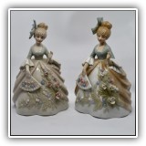 C14. Pair of porcelain lady figurines.  One with repaired flower.  One with repaired thumb. 7.5"T - $24 for the pair
