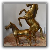 B3. Pair of brass horses. 14"T and 8"T. - $38 for the pair