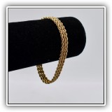 J7. 14K Yellow gold triple twist bracelet, 7" long - $595