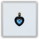 J16. Sterling silver, onyx and blue stone heart pendant - $12
