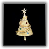 J17. Gold tone Christmas tree pin with one missing stone - $6