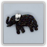 J23. Crystal covered elephany pin with silver tone ear - $14