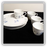 E48. Set of luncheon plates with cups. - $16 for the set. - $16.