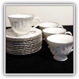 E49. Set of 4 Syracuse "Silhoutte" cups and 10 saucers. - $18.