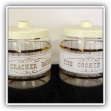 K40. 2-Piece Pyrex cookie jar and cracker barrel set.  7"T -  $32 for the set