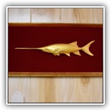 P63. Carved swordfish on red velvet in gilt frames. - $20 each