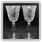 G17. Set of 4 swirled crystal wine glasses. - $8 for the set
