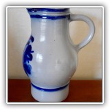 E43. Stoneware pitcher. - $18