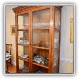 F37. Domain glass front oak cabinet. 88"h x 55"w x 15"d - $1,500
