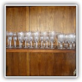 G03. 36 etched crystal glasses including 9 wine glasses ($24), 8 water glasses ($24), 9 cordials ($29), and 10 desserts ($30)
