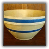 P33. Yellowware bowl with blue stripe. 5.5"h x 10.75"w