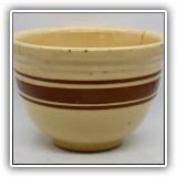 P39. Small yellow ware bowl with brown stripe. 4.5"h x 6.5"w