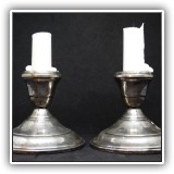 S01. Pair of sterling silver candlesticks. 3"h. Some dimpling to silver - $32 for the pair