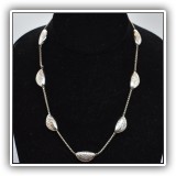 J31. Silvertone necklace