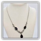 J14. Simmons sterling silver and onyx necklace. 15"  $28