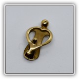 J16. Sterling with gold overlay mother and child pendant.  0.75"h - $18