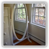 F58. White standing mirror. 56"h x 26"w - $60