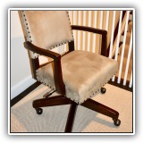 F28. Ultrasuede desk chair with nailhead trim. 34.5"h x 21.5"w x 19"d - $150