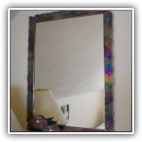 D22. Mirror with iridescent glass frame. 22.5"h x 17.5"w - $48