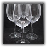 G03. Four unmarked wine glasses. 9.25"h - $12 for the set