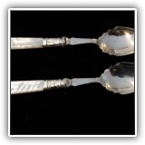 S09. Pair of silverplate spoons with mother-of-pearl handles - $18