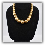 J09. 14K Gold graduated bead necklace. 15"l. Weight: 43.3g - $1,950