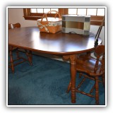 F53. Laminate top table with 2 12" leaves and 5 chairs. Table: 28.5"h x 42"w x 42"d - $250 for the set