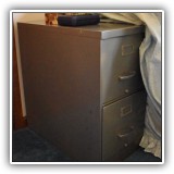 F55. Two-drawer metal file cabinet. - $20