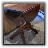F73. Small double drop leaf side table. Open dimensions: 22"h x 25"w x 21"d - $48