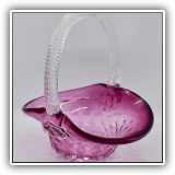 G24. Clear and cranberry glass basket -shaped candy dish. 6"h x 5.5"w x 6"d - $14