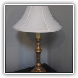 D05. Gold colored table lamp w/leaves on base. 25"h - $60