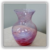 G31. Cranberry glass swirl design vase. 5.75"h