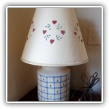 D26. Ceramic table lamp w ith heart flowers design and stenciled shade. 23"h x 8"w - $65