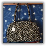 H07. Vera Bradley black and white handbag with stripes. 10"h x 12"w x 5"d  - $24
