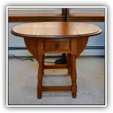 F21. Hitchcock oak double drop leaf side table with stenciled decoration on top. Open dimensions: 22.5"h x 30"w x 22"d - $100