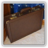 H16. Hard top leather briefcase. - $16