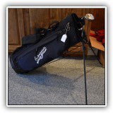 L13. Golf clubs and Entemann's golf bag. - $45