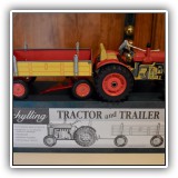 Y02. Schylling tin wind-up tractor with trailer - $20