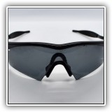 H38. Oakley sunglasses. Some residue on lenses.