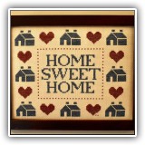 A21. Framed "Home Sweet Home" cross stitch. Frame: 8"hx10"w - $18