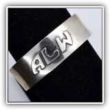 J04. Sterling cuff bracelet marked Rosenquist. Monogrammed "ALW" - $12