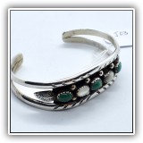 J03. Mary S. Lew Navajo silver cuff bracelet with green turquois and moonstone. - $65 