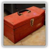 T19. Red Dayton toolbox with pipe pieces. Dented. 7.5"h x 16.75"x 7"d 