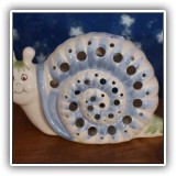 D11. Ceramic snail night light. - $8