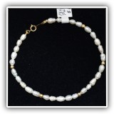 J47. 14K gold fresh water pearls bracelet. 7" long. - $65
