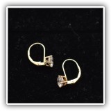 J51. 14K Gold and cubix zirconia earrings. - $95